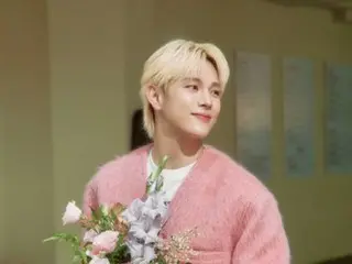 任时完，身穿粉色外套，甜美迷人